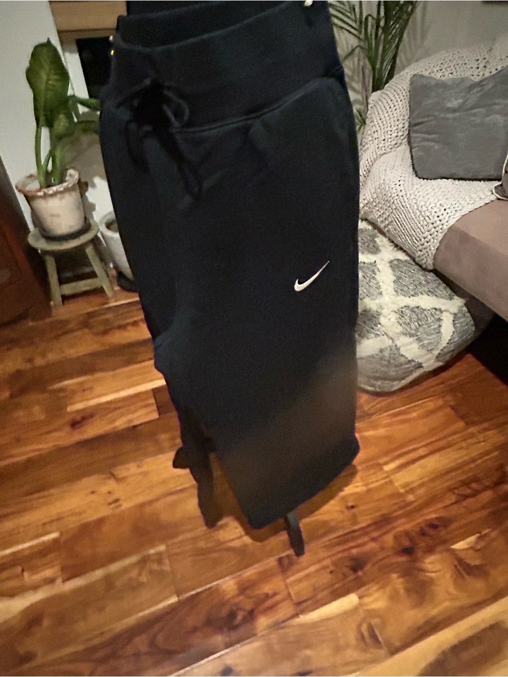Nike Black Sweats with White Swoosh Accent